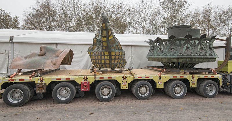 Statue of Liberty's Face, Torch, and Torch base on trailer 

