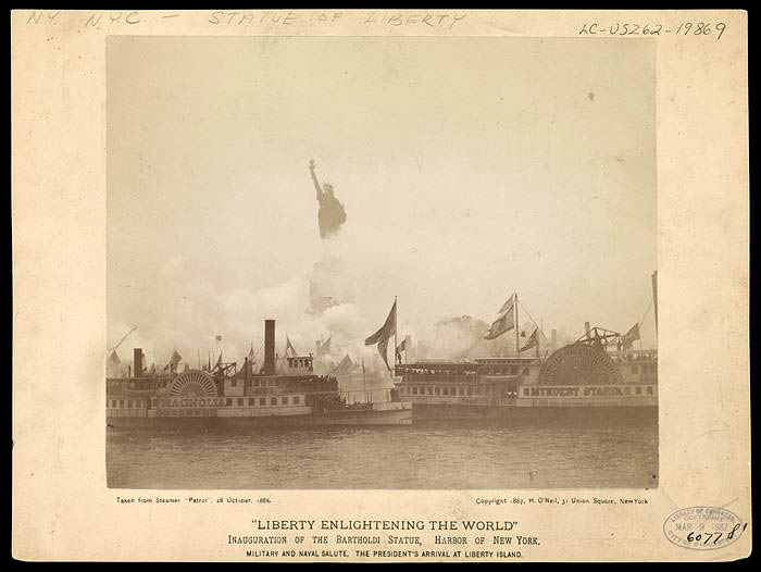 A 21-gun salute marked President Grover Cleveland’s arrival and clouded the Statue in smoke.