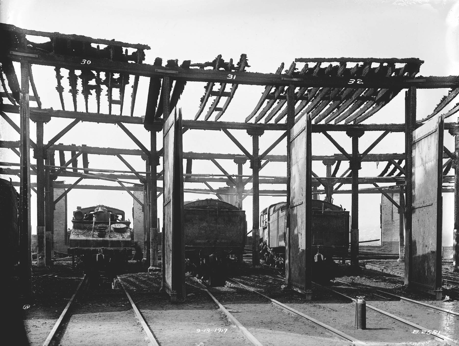 Charred D.L. & W. roundhouse exterior after fire