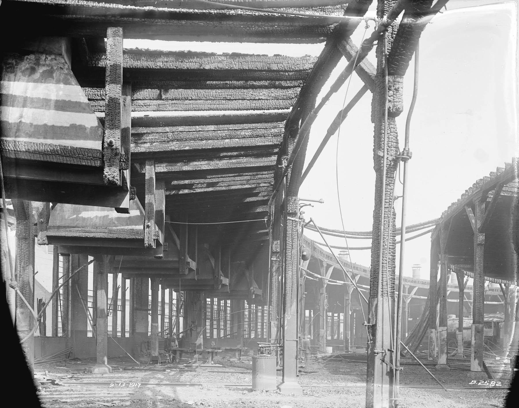 Charred D.L. & W. roundhouse exterior after fire
