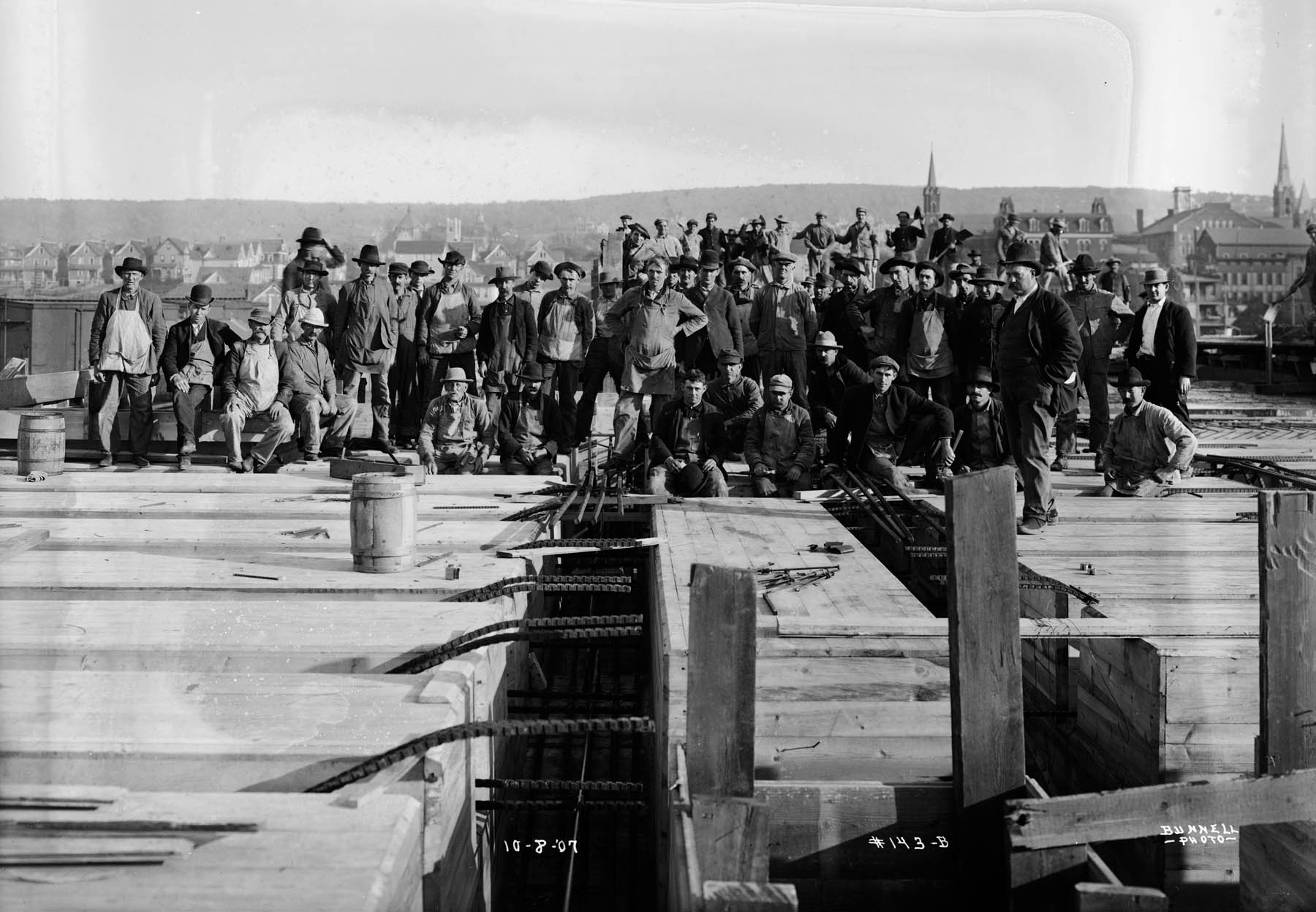 Construction workers at Delaware, Lackawanna, and Western Railroad locomotive shop