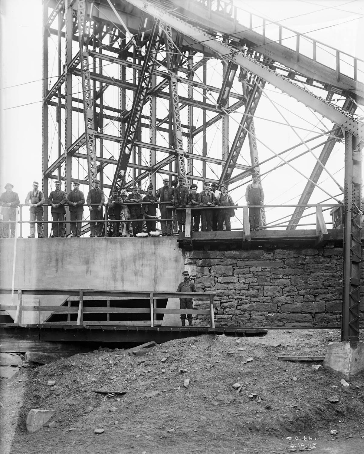 Miners receiving safety lamps