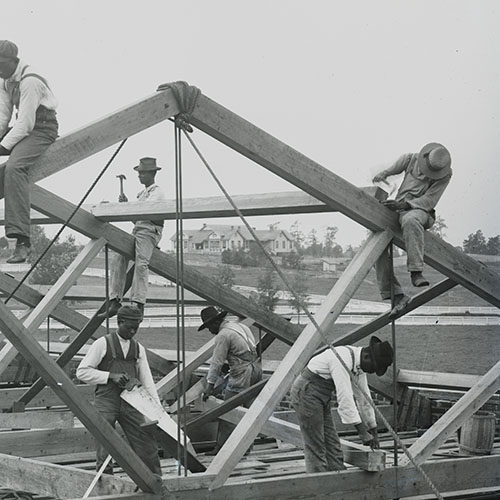 Roof construction by students
at Tuskegee Institute