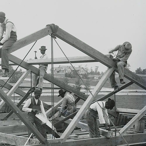 Roof construction by students
at Tuskegee Institute