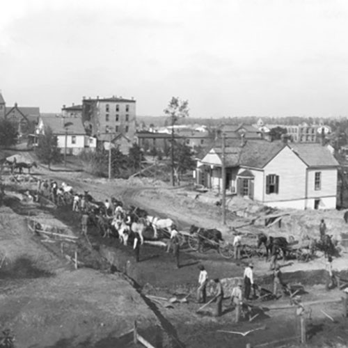 Students digging the foundation for the C.P. Huntington Memorial Building at Tuskegee Institute