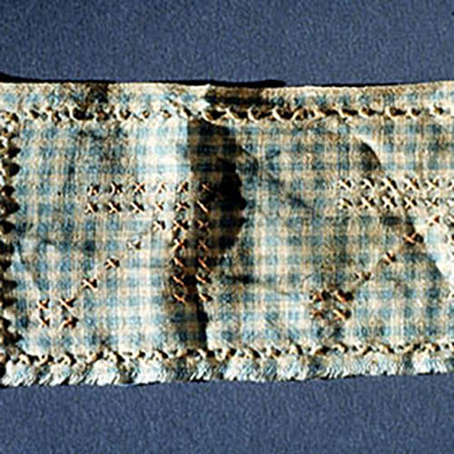 Cloth with cross stitch