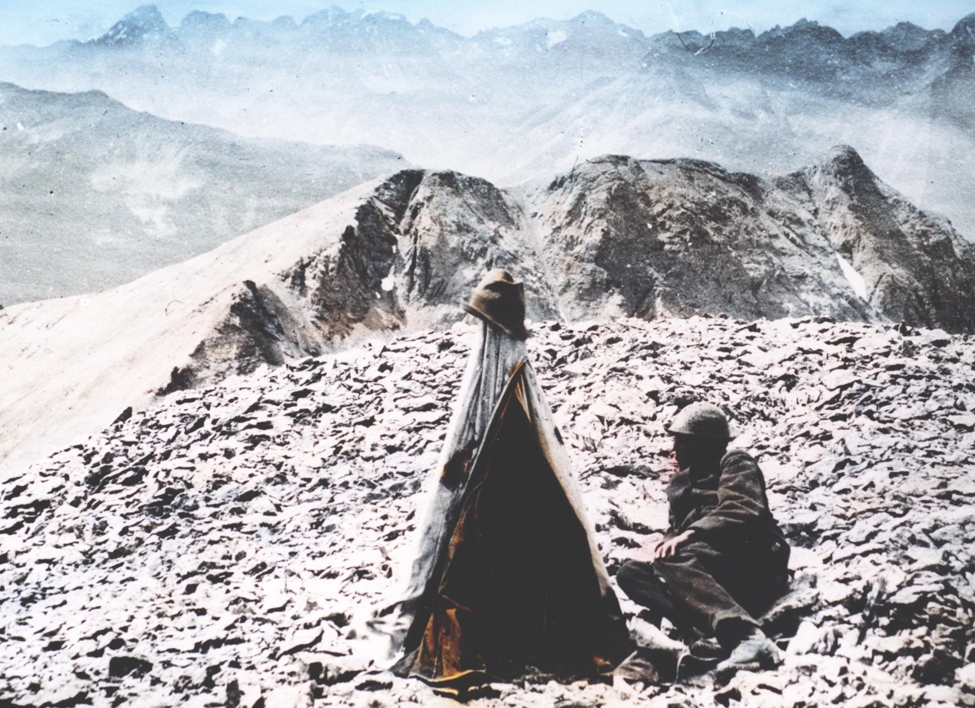 Photographer on the summit of Sultan Mountain