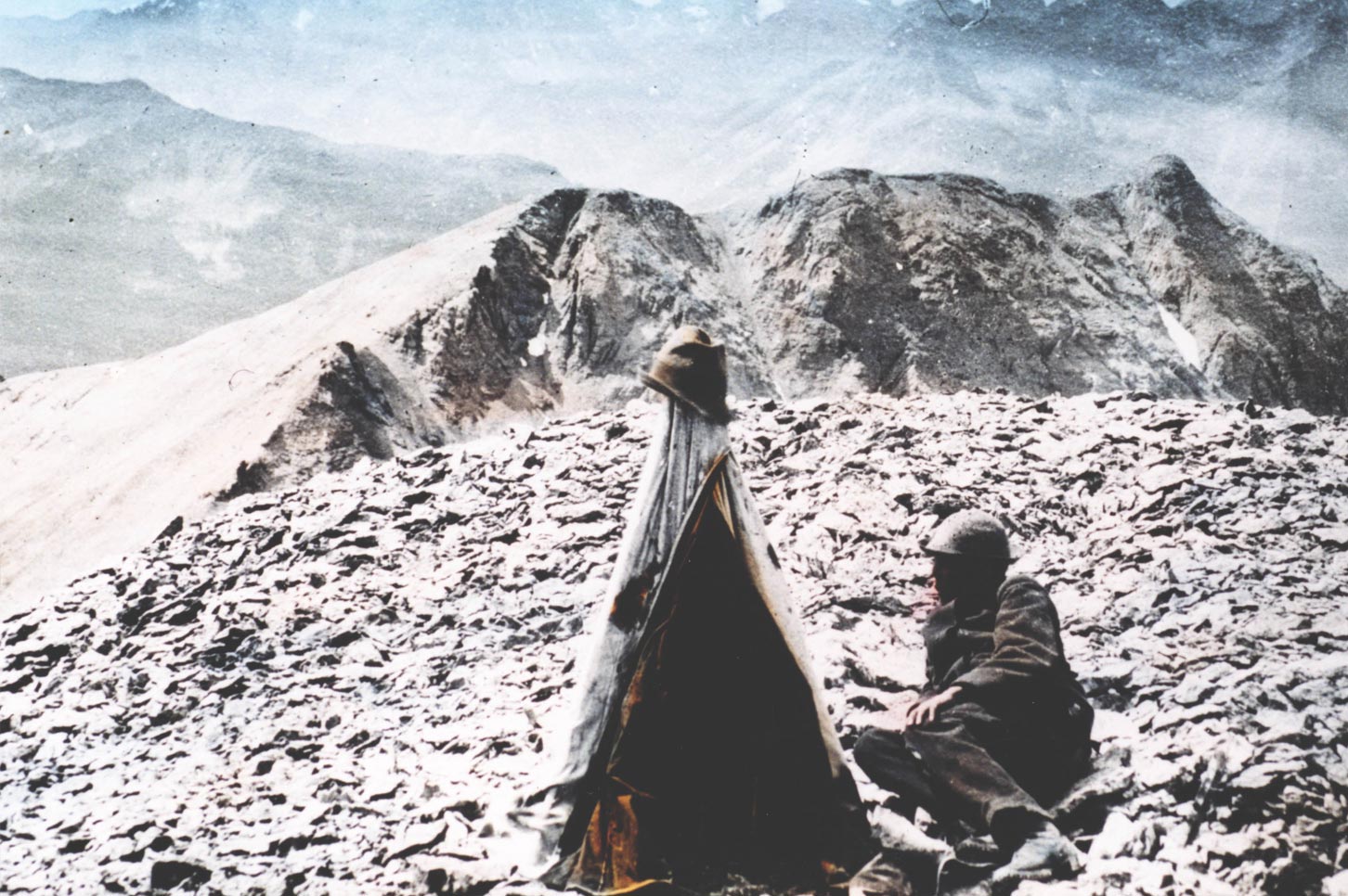 Photographer on the summit of Sultan Mountain