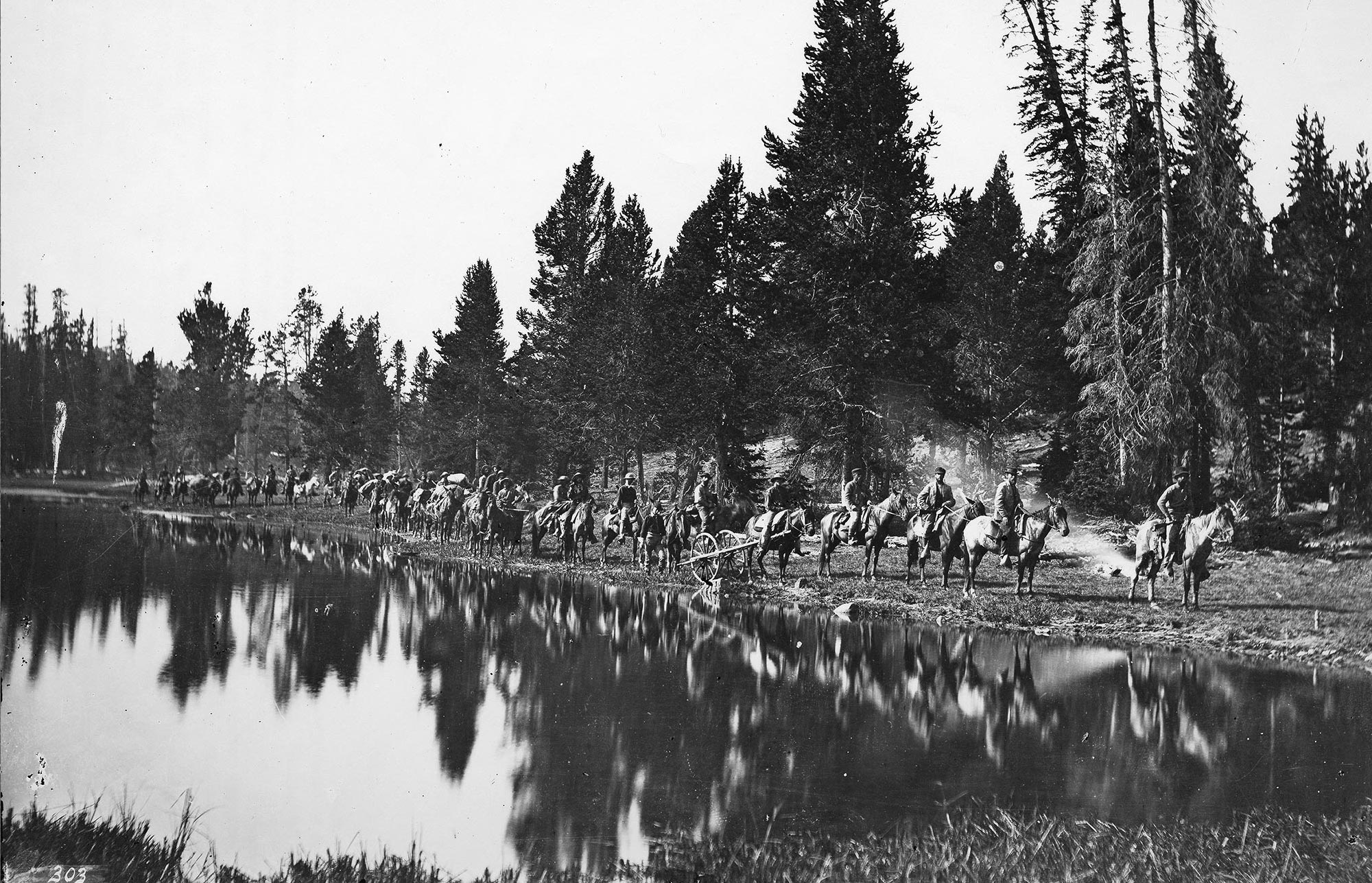 Survey Party, with pack train, en-route upon the trail between the Yellowstone River and East Fork, showing the manner in which all parties traverse these wilds