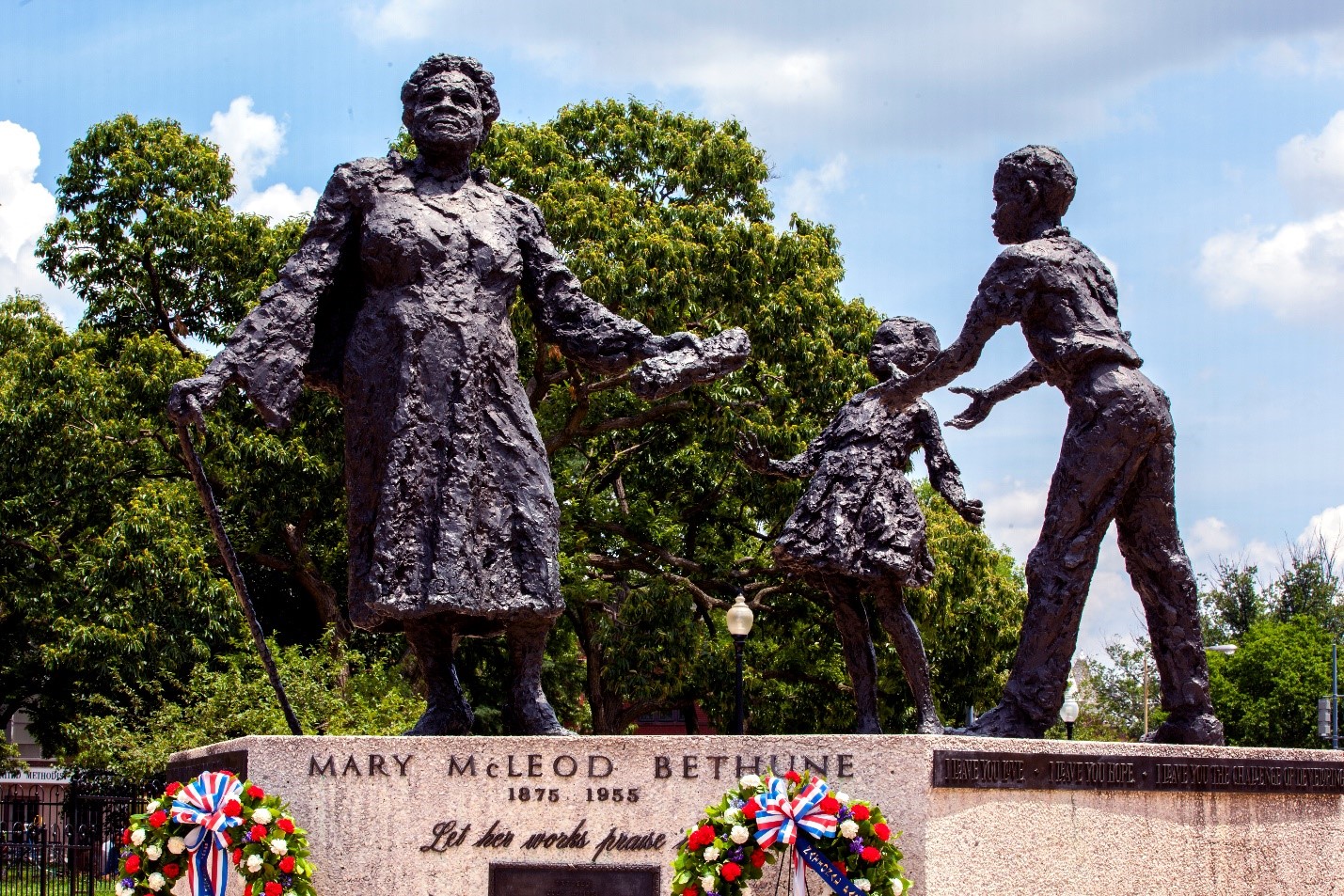 Bethune Memorial Image of the Bethune Memorial on a sunny day with wreaths places at the base of the memorial.