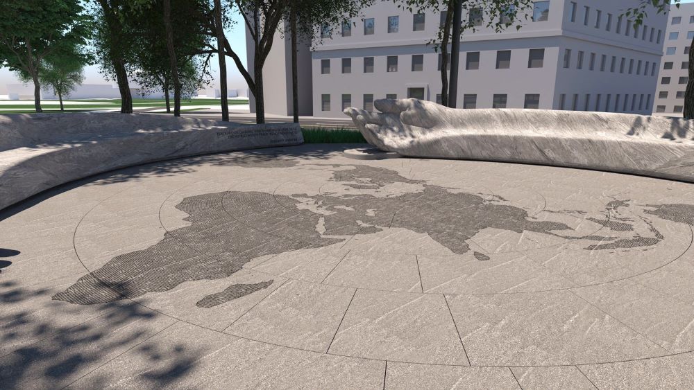 Large open plaza with a bench around the edge in the shap of an arm and hand