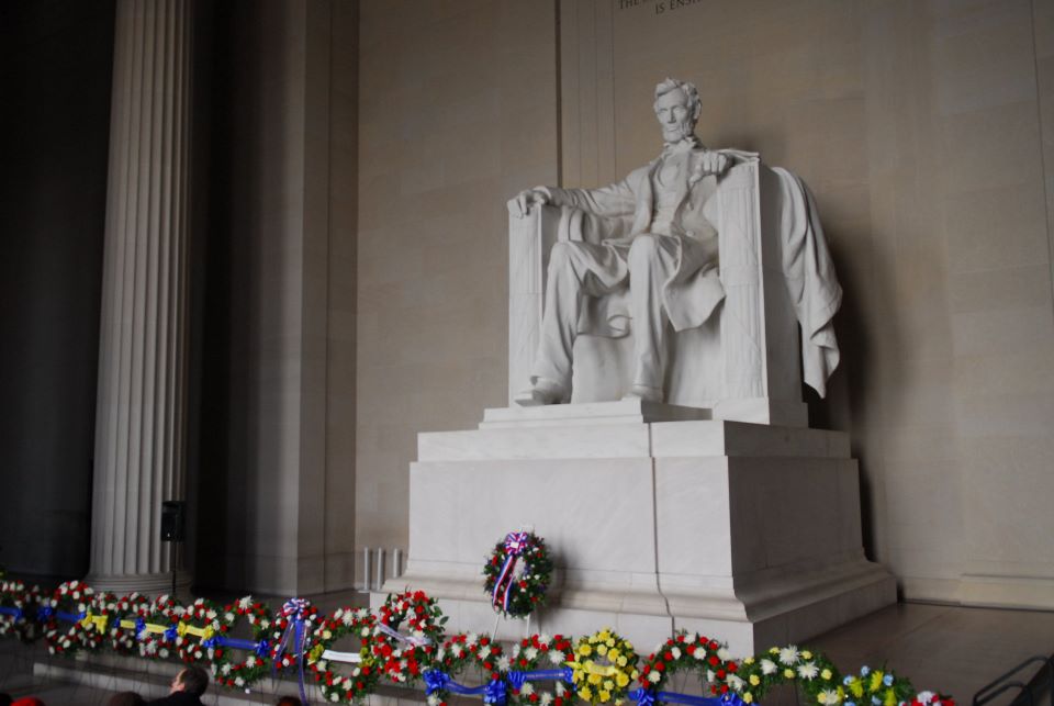Wreaths in front of statue of Abraham Lincoln