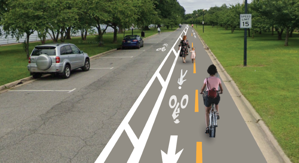 Conceptual photo of vehicles, pedestrians and cyclists on a tree-lined road