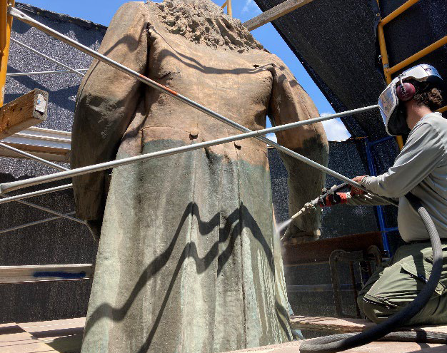 Statue being cleaned