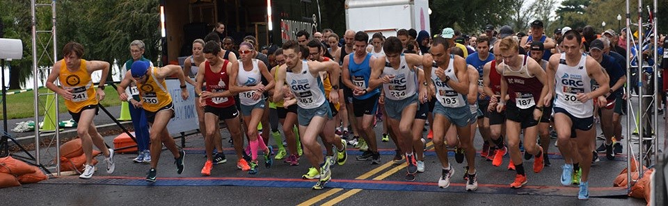 Group of runners at a race start line