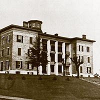 Marine Hospital large three-story building on hillside