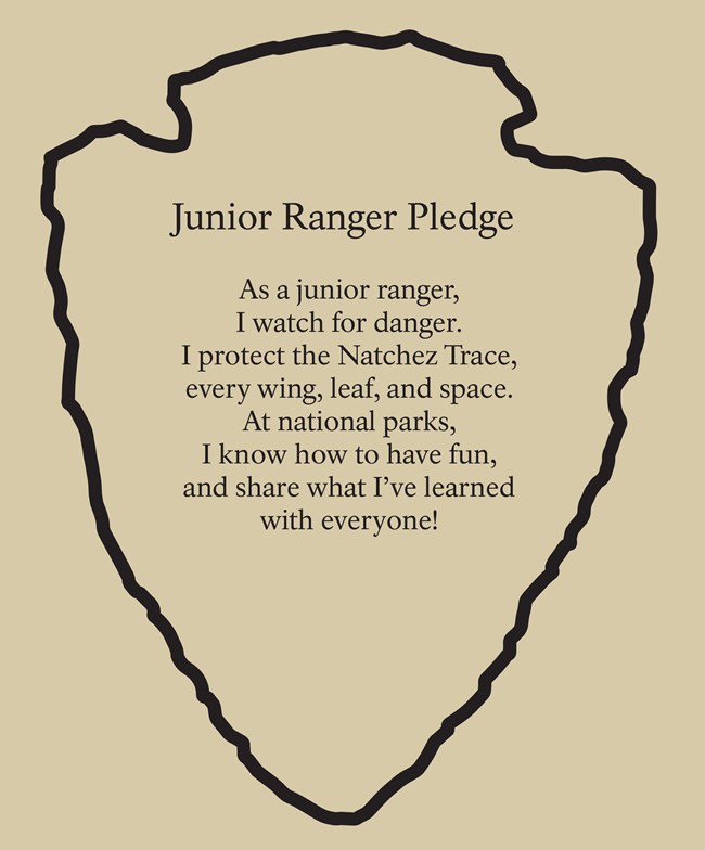 Black arrowhead  outline around the text: Junior Ranger Pledge. As a junior ranger, I watch for danger. I protect the Natchez Trace, every wing, leaf, and space. At national parks, I know how to have fun, and share what I've learned with everyone.
