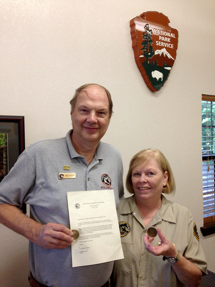 Volunteers Mark and Marge Hoecker volunteered over 200 hours, earning them each a Centennial Volunteer Challenge Coin, as volunteer interpretive guides at the Mount Locust Historic House and Plantation along the Natchez Trace Parkway.