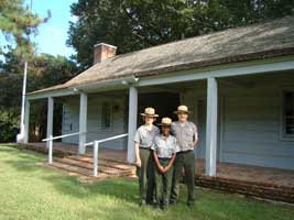 Three Park Rangers at the Ridgeland Information Cabin.