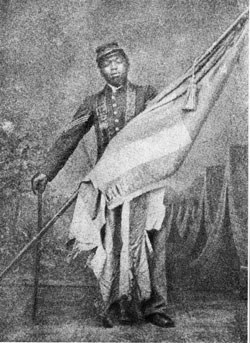 Carl-Cruz-Collection-NBHSCarney_small William Carney holds the American flag while in Union Army colors.