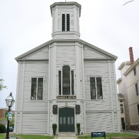 A white church on Johnny Cake Hill.