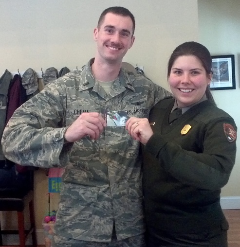 Active duty U.S. Airforce members of the 6th Space Warning Squadron receive their passes through an outreach effort by New Bedford Whaling National Historical Park.