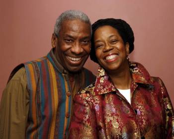 Kim and Reggie Harris a man and a woman, both smiling