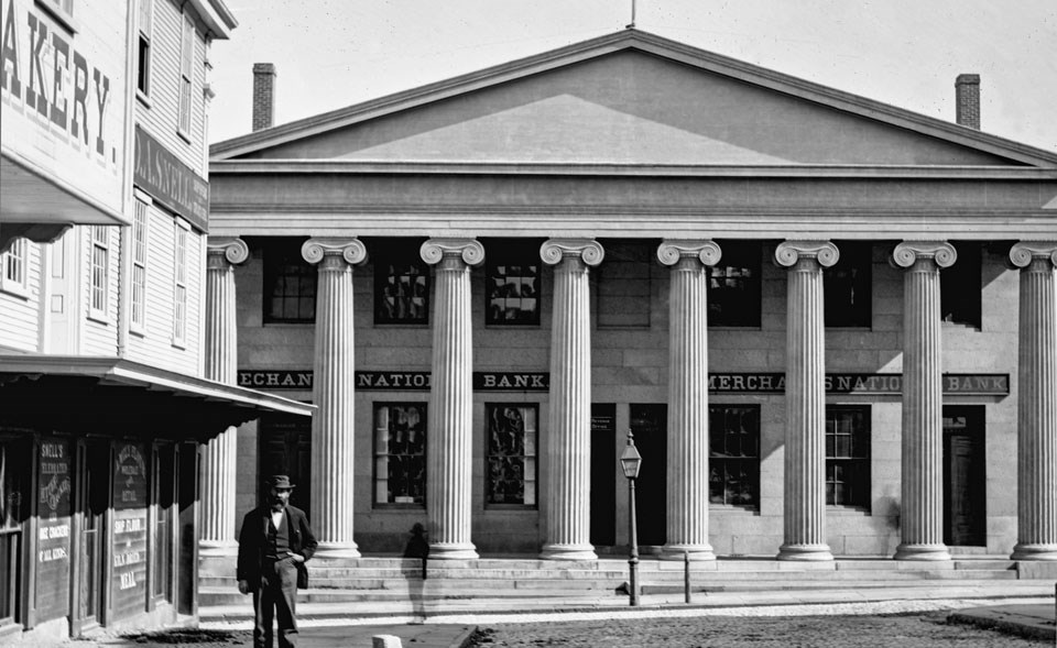 Historic black and white photo of the double bank building.