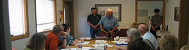 Nez Perce elder Hoarce Axtell and a group of teachers at the park.
