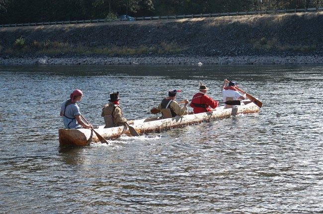 Lewis and Clark Reenactors in a canoe on the Clearwater River