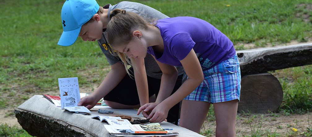 kids identifying animal tracks