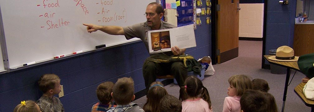 ranger teaches students in a classroom
