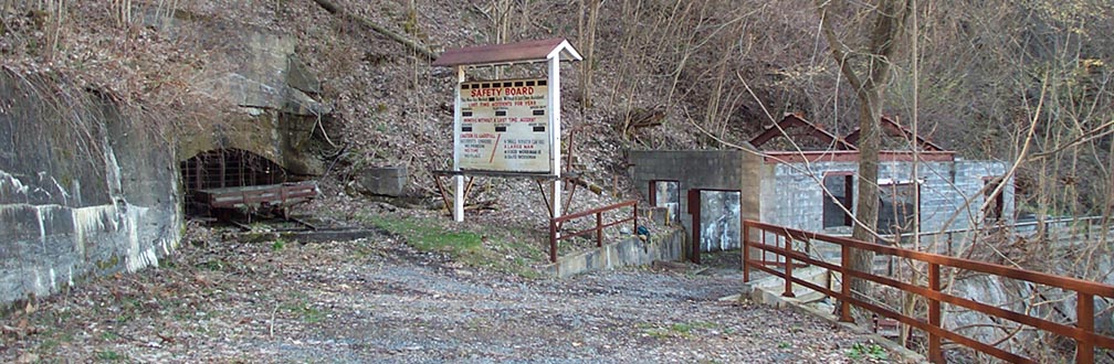 old mine entrance and mining ruins