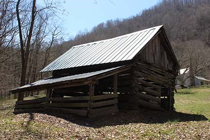 small log barn