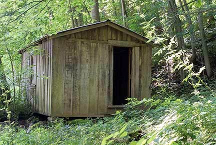 small wooden sided building