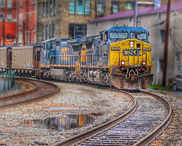 Train with tracks and buildings