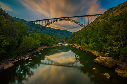 pink clouds over the New River Gorge Bridge