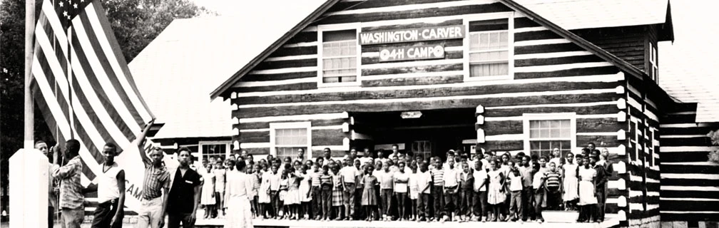 Camp Washington Carver campers outside lodge