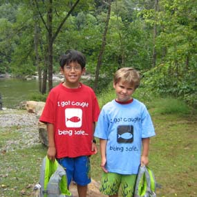 two young visitors with water safety tee shirts two young visitors with water safety tee shirts