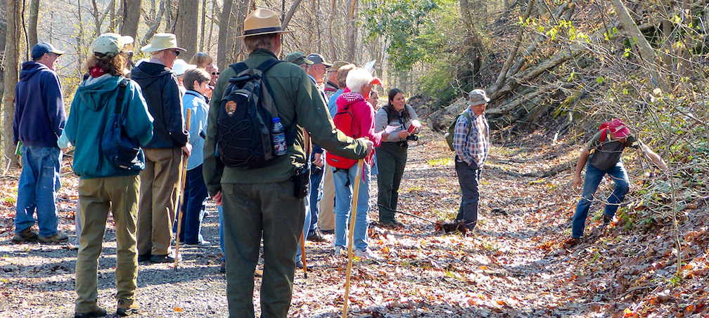 Rangers and visitors on wildflower hik Rangers and visitors on wildflower hik