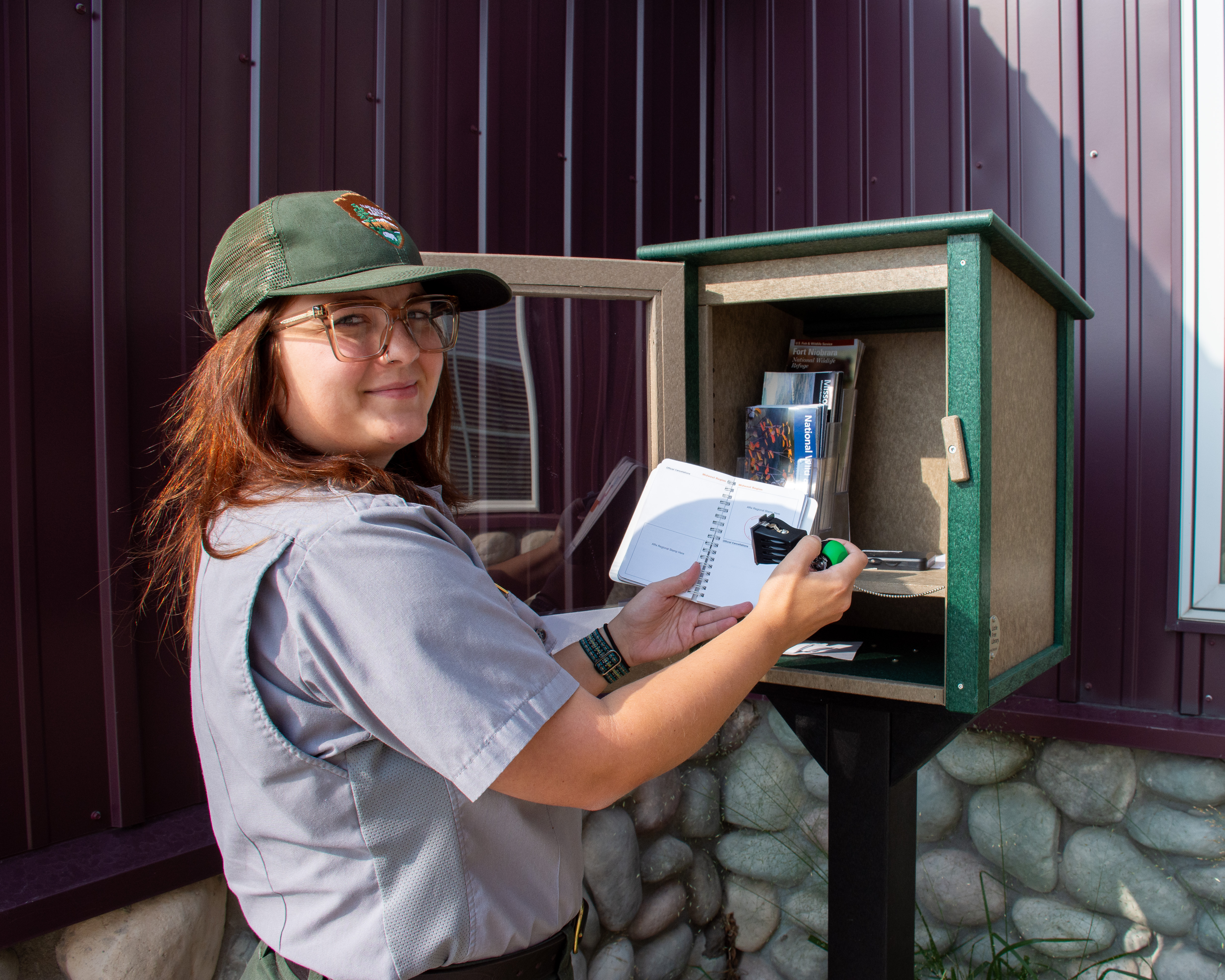 Passport Stamp Station. Ranger shows off Passport Stamp Station.
