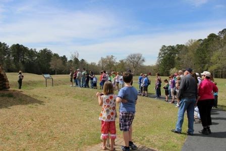 visitors learning about the park