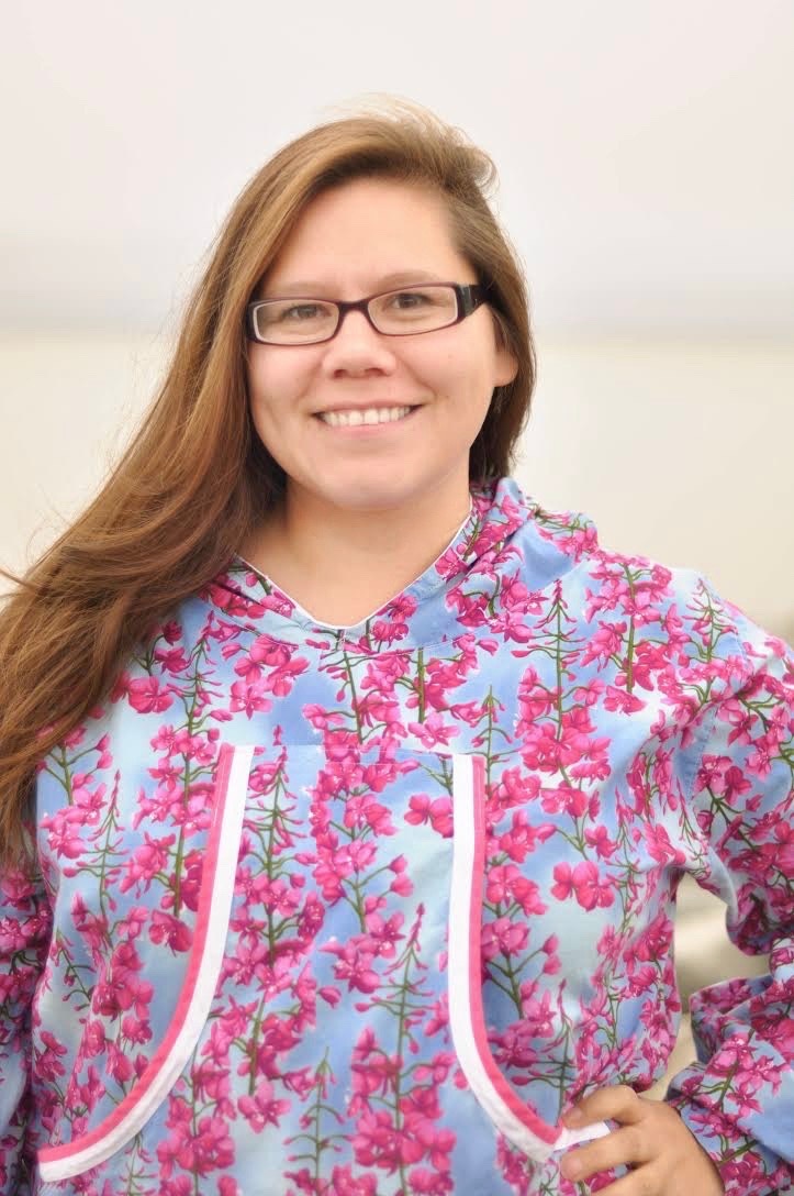 Headshot of woman wearing traditional Inupiaq atikluk.