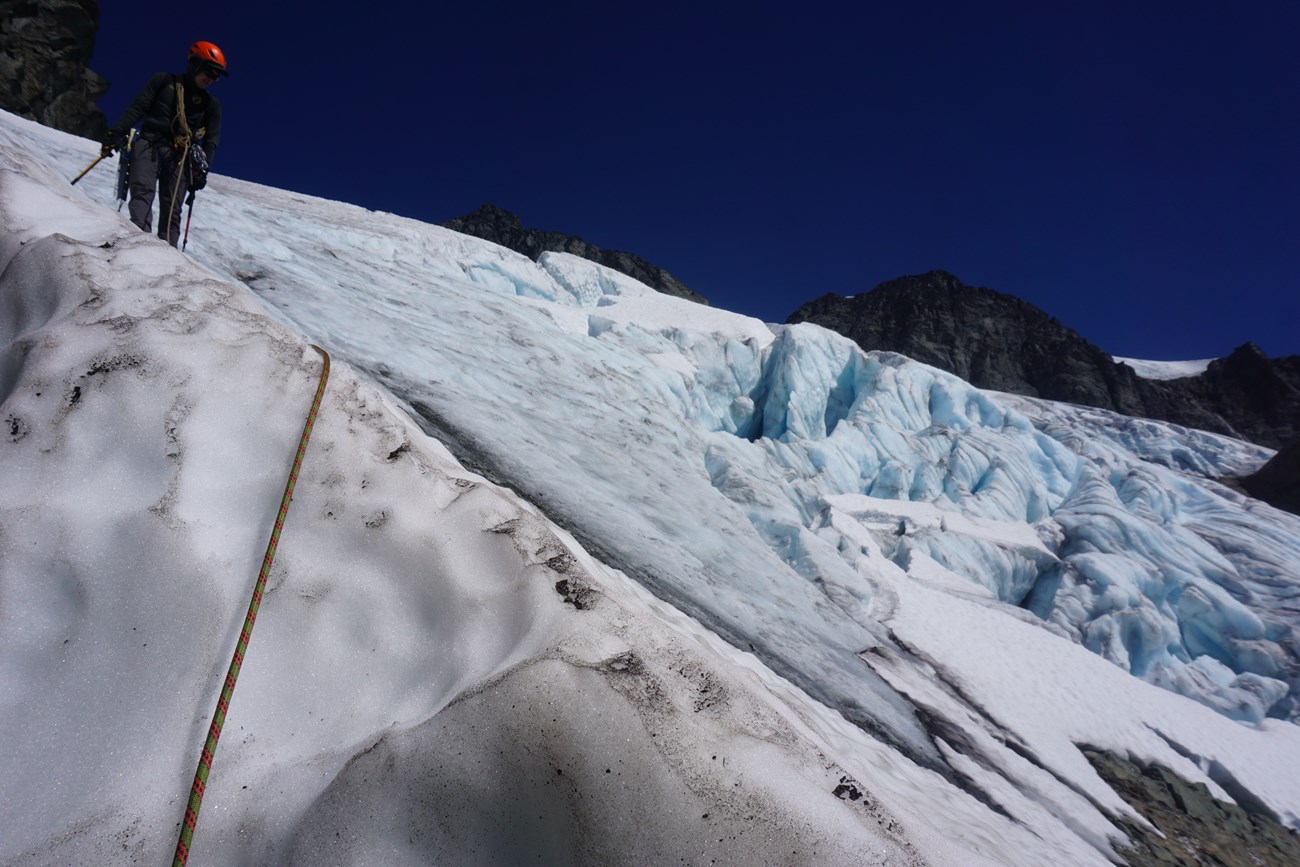 A North Cascades Ranger descends ice off of the Upper Curtis glacier