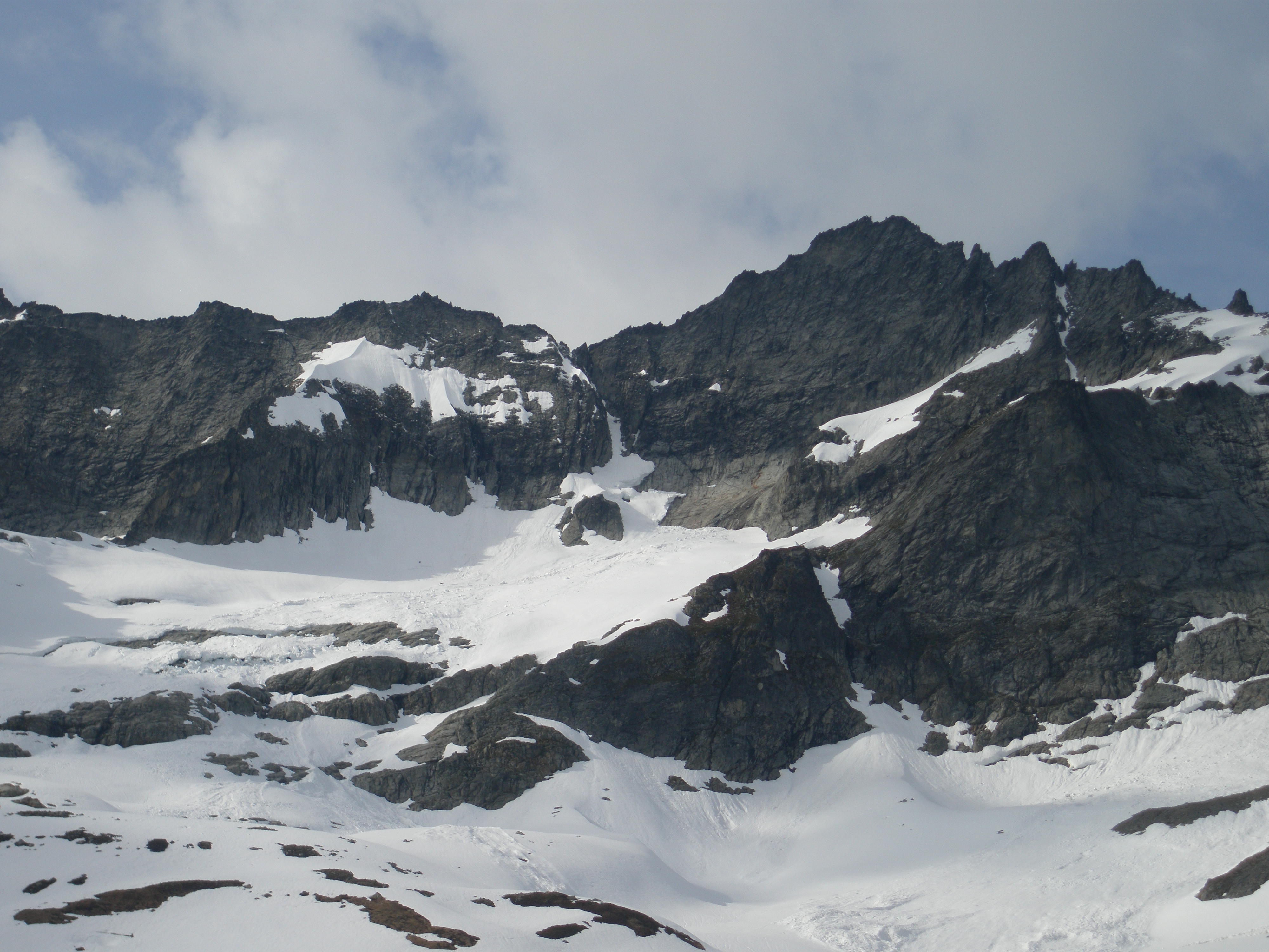 Photo of Forbidden Peak from the south, showing the West Ridge Coulior