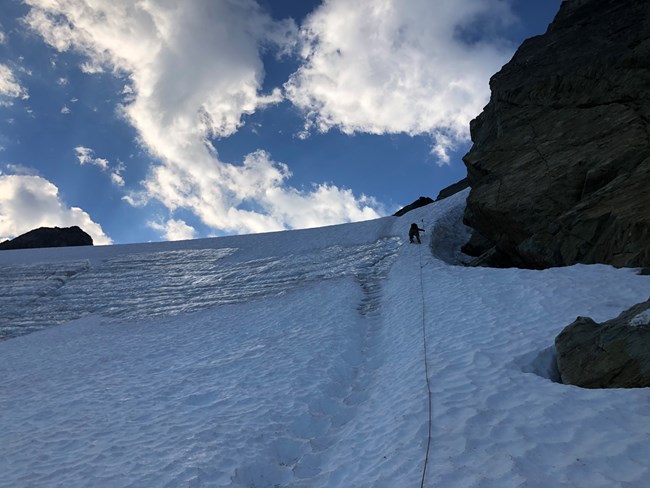A North Cascades Ranger ascends glacier ice up Winnie's Slide