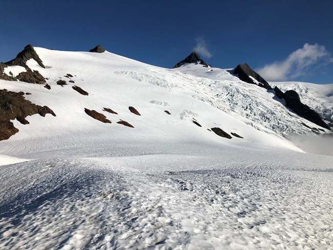 View of snowy mountain with glaciers.