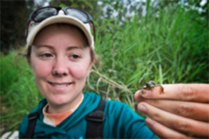 Amanda Kissel Holding an Amphibian Photo: ©Amanda Kissel