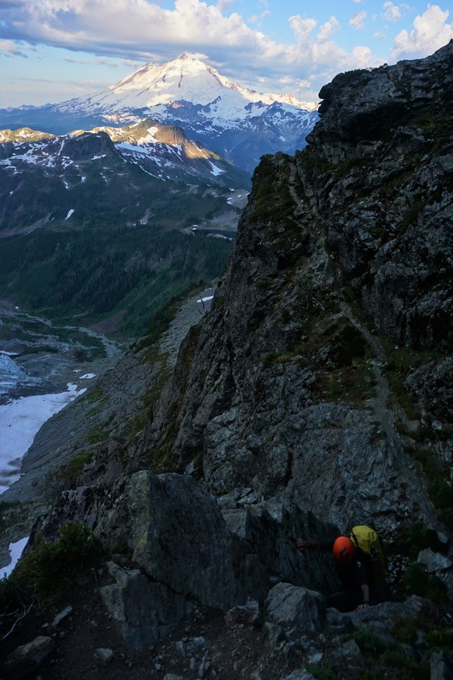 A ranger ascends the Fisher Chimneys on Mt. Shuksan