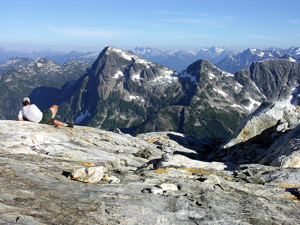 Climber in foreground, looking south toward the Pickets